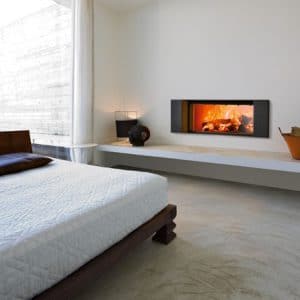 cheminée foyer bois MCZ Plasma 115 avec porte relevable avec cadre decoration Klee chambre